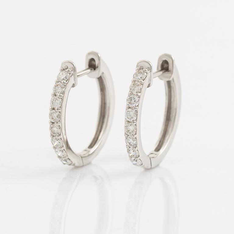 Brilliant cut diamond hoop earrings, total 0,58 ct.