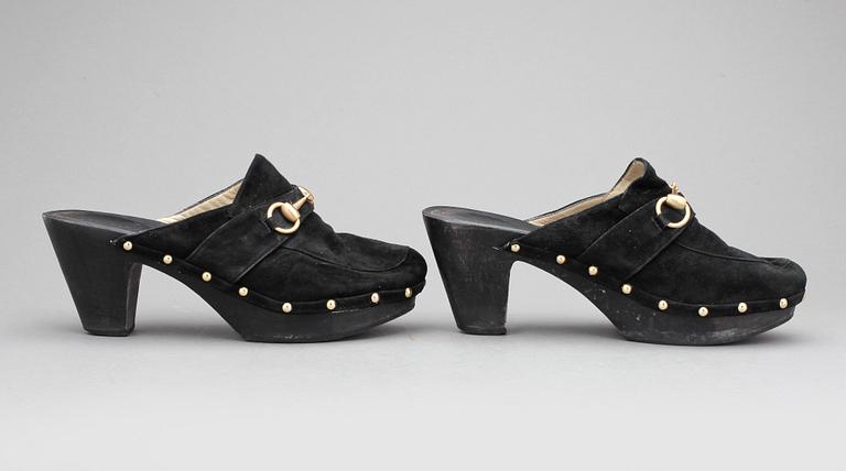 SKOR, ett par slip in, Gucci.