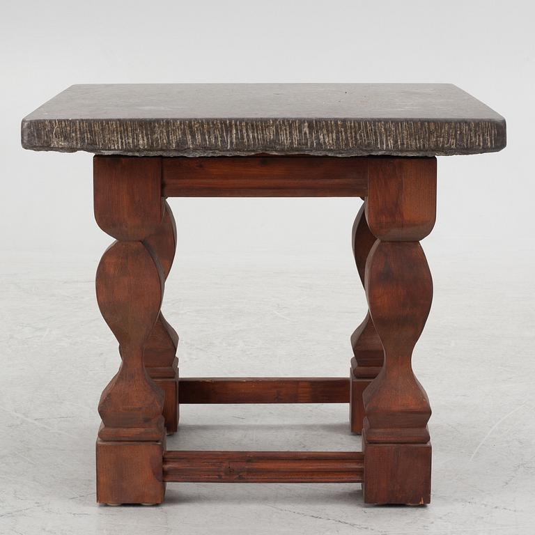 A Baroque style side table, late 20th Century with older top.