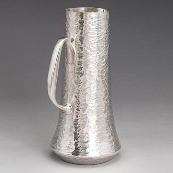 TAPIO WIRKKALA, A silver pitcher with four silver beakers, marked TW, Kultakeskus oy, Hämeenlinna Finland 1973 and 1977.