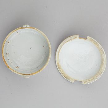 A famille rose butter tureen with cover and two cups with three odd stands, Qing dynasty, Qianlong (1736-95).