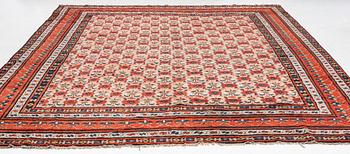 An antique Indian carpet, c 390 x 299 cm.