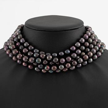 Necklace, five-row with cultured black pearls, 18K gold and white gold with brilliant-cut diamonds.