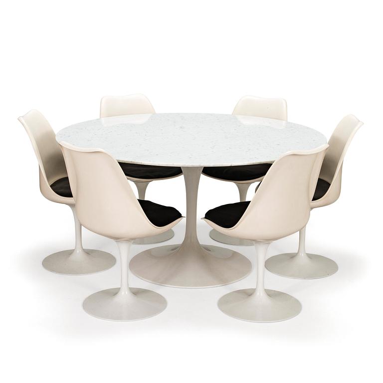 Eero Saarinen, a 1970s 'Tulip' marble-top table with six chairs.