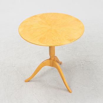 Carl Malmsten, a birch-veneered side table, Sweden, later part of the 20th century.