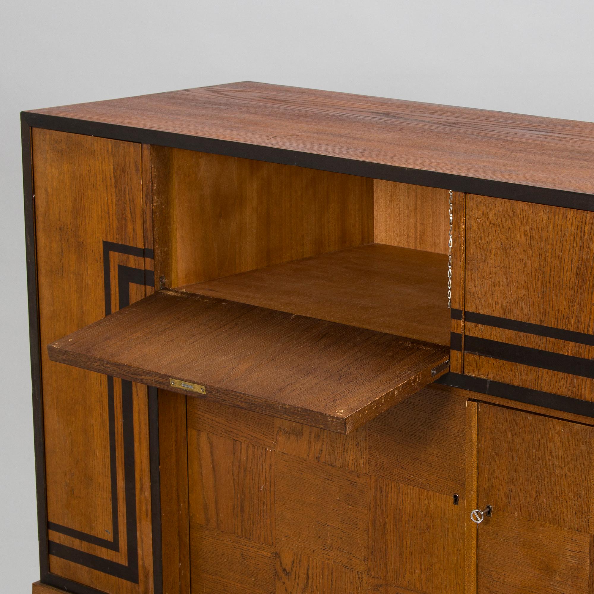 A 1930s functionalist style sideboard.