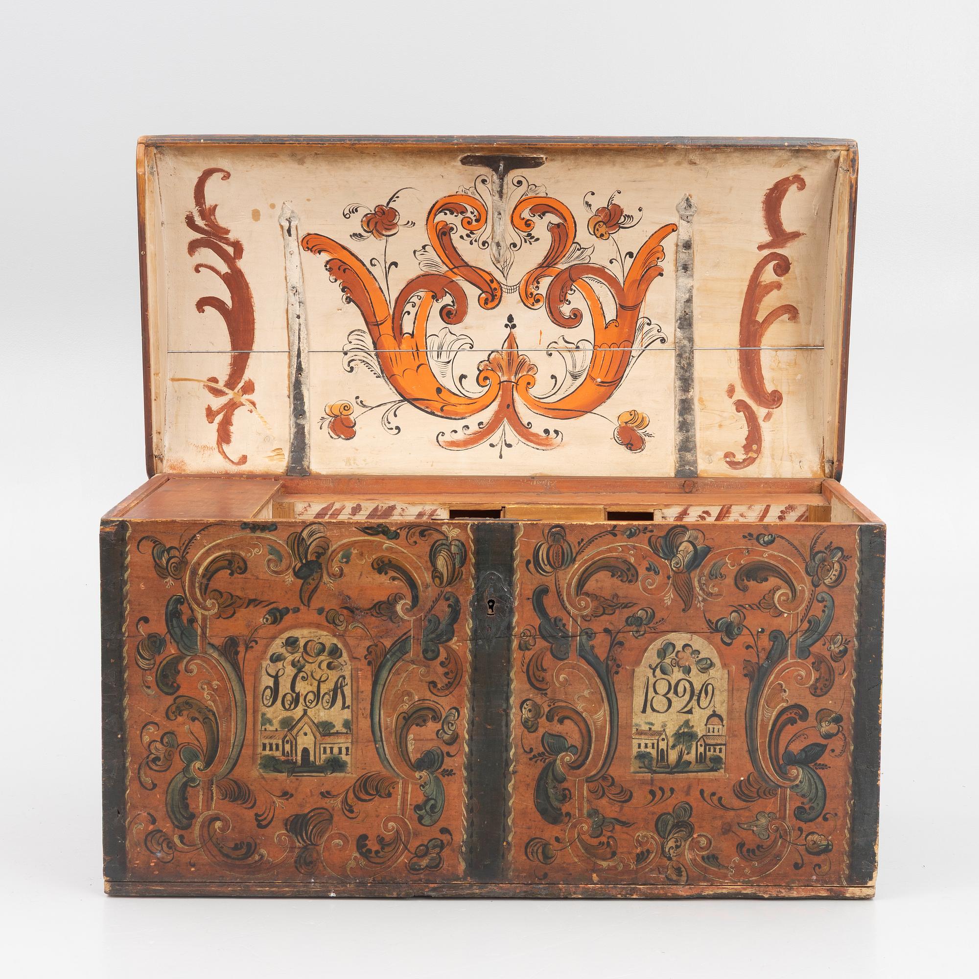 A wooden Dalecarlian chest, Sweden, dated 1820.