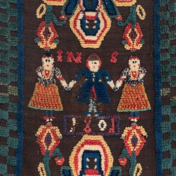 A carrige cushion, knotted pile in relief, c. 104 x 48 cm, probably Skytts district dated 1801.