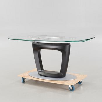 A 21st century "Orbital" dinner table by Pininfarina for Calligaris.