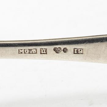 21 pieces of silver cutlery, 1807 - mid 20th century.