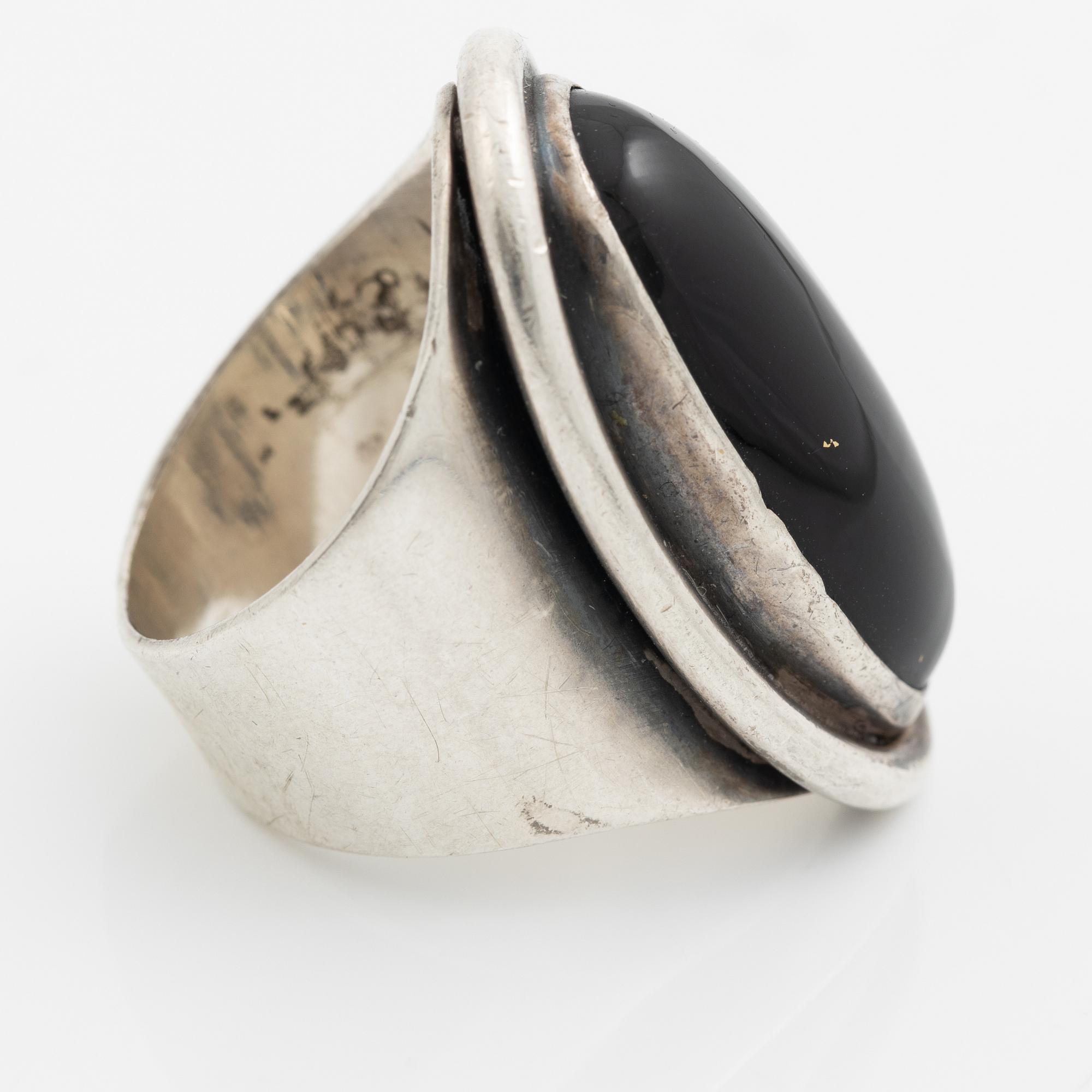 Ring, Carl Ove Frydensberg, silver with cabochon-cut black stone, Denmark.