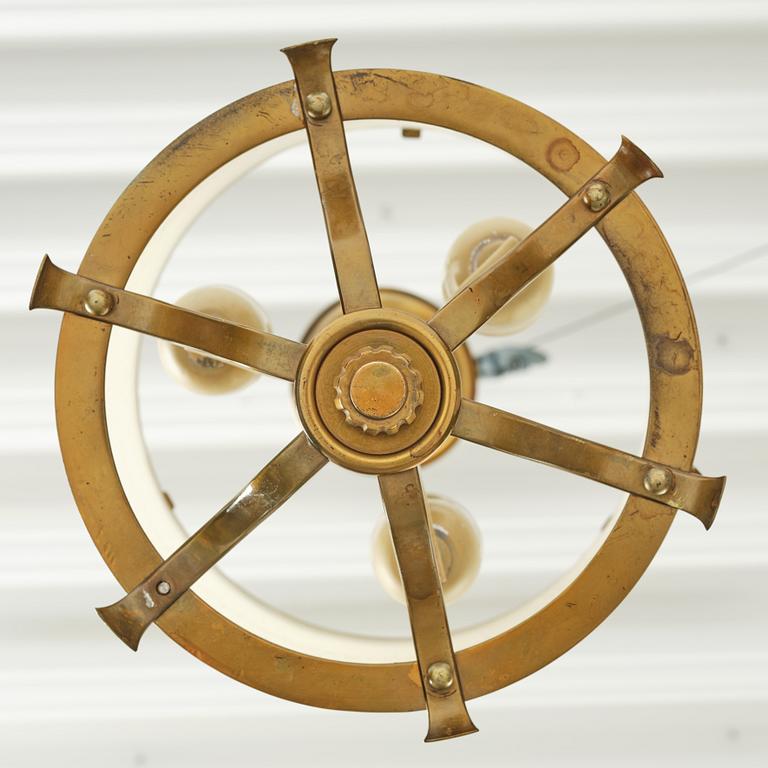 Swedish Grace, a brass and glass lamp, 1920s-40s.