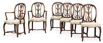 An Axel Einar Hjorth set of 4 Swedish Grace chairs and a pair of armchairs, 'Östanå', Nordiska Kompaniet, 1929.