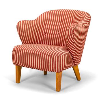 Flemming Lassen, an armchair manufactured by Asko 1952-1956.