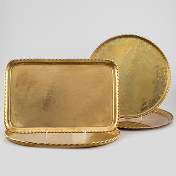 Four brass trays, Sweden, mid20th century.