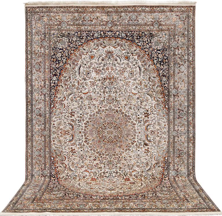 A silk Kashmir carpet, approx. 300 x 200 cm.