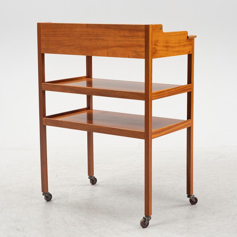 Josef Frank, a mahogany serving table/bar table, model 2227, Firma Svenskt Tenn, second half of the 20th century.