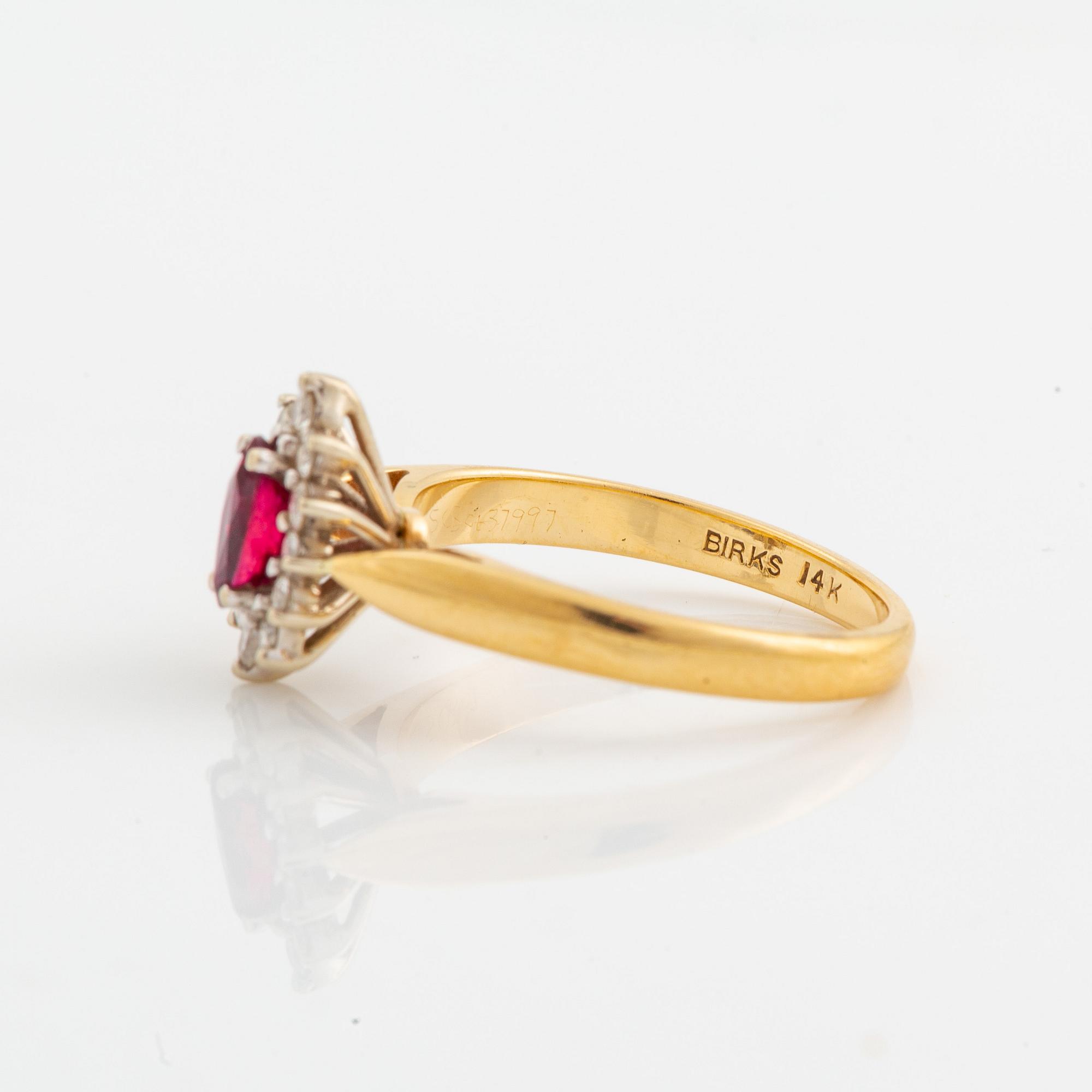Navette cut ruby and brilliant cut diamond ring.