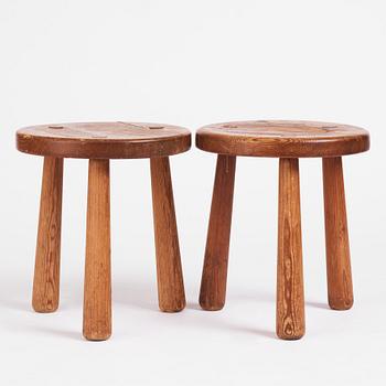 Axel Einar Hjorth, a pair of "Skoga" stained pine stools, Nordiska Kompaniet 1930s.