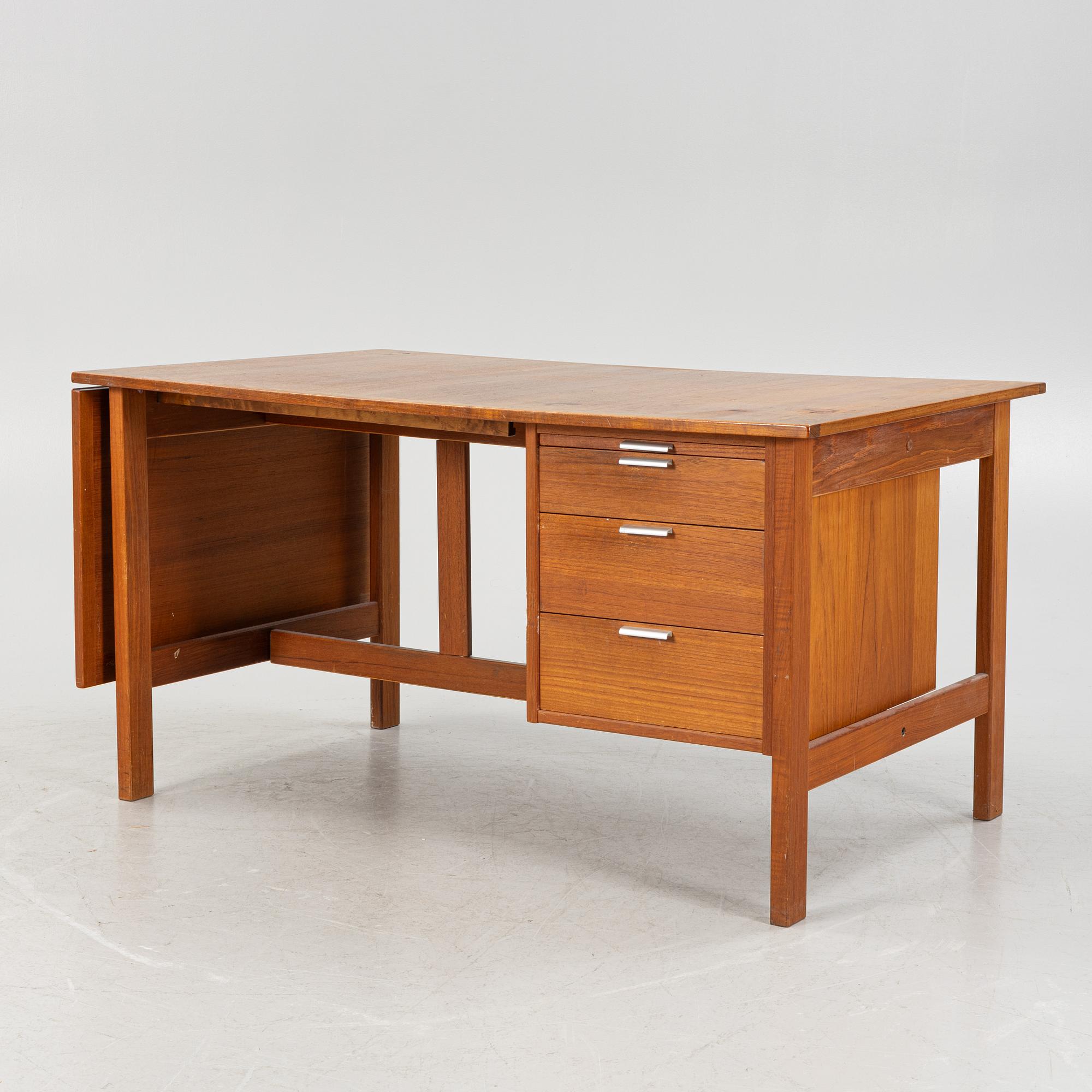 A 1960's teak desk.