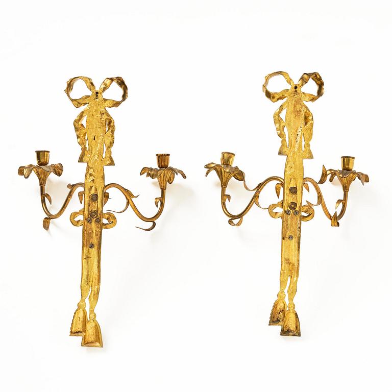 A pair of gilt bronze two-branch appliques after F. L. Rung, late 19th century,
