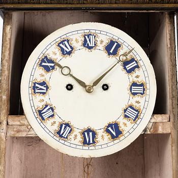 A 18th century longcase clock.