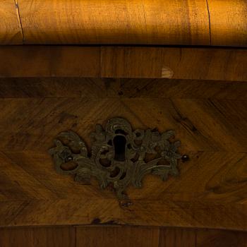 A late baroque mid 18th century chest of drawers by Christian Linning.