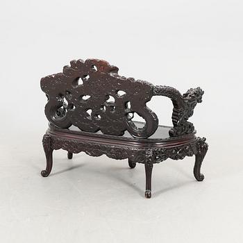 A Chinese wooden sofa 20th century.