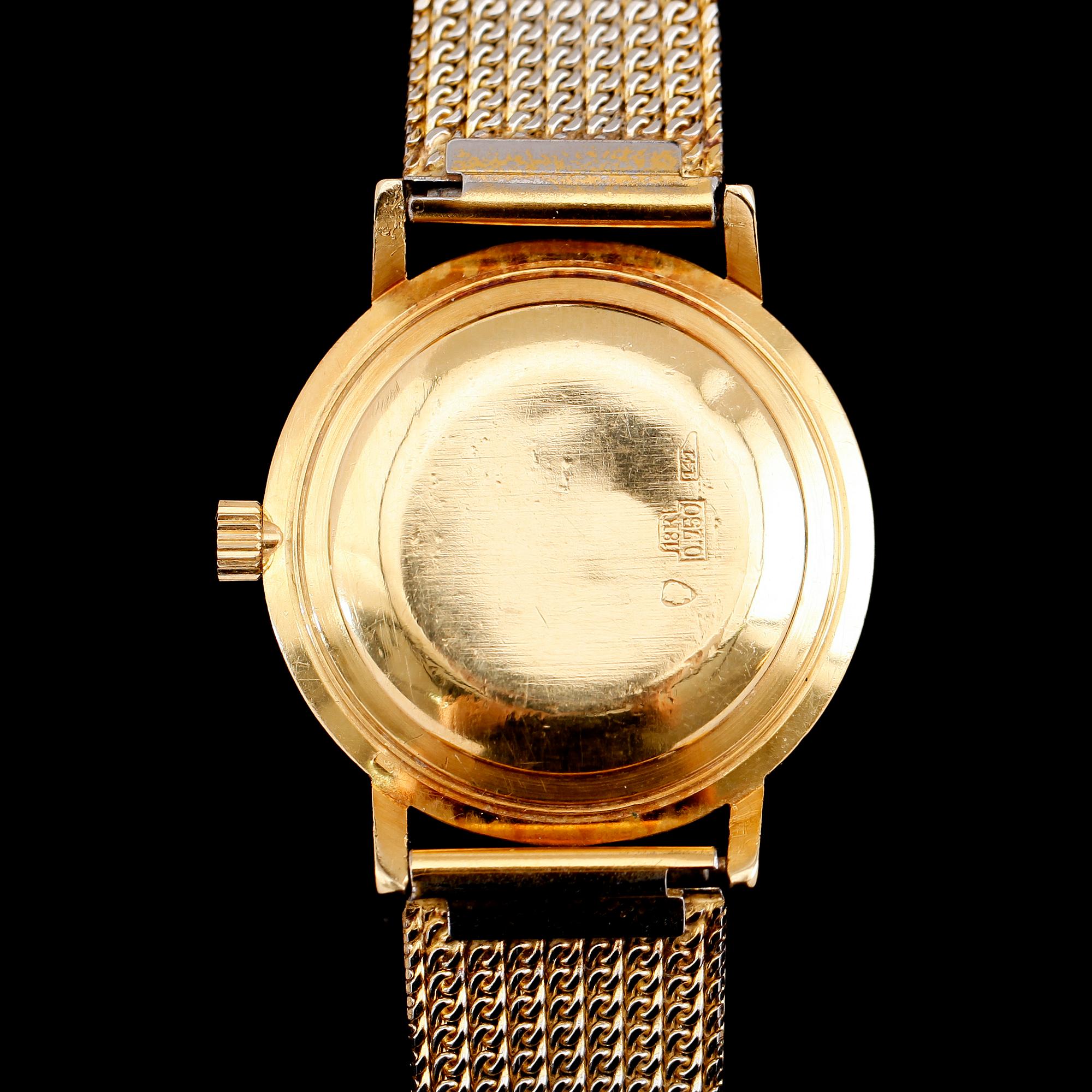 ARMBANDSUR, 18 k guld, Nyge.