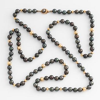 A cultured pearl necklace with 14K gold beads.