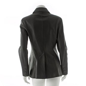 HERMÈS, a black leather suit jacket.