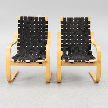 Alvar Aalto, a pair of model 406 armchairs, Artek, end of the 20th century.