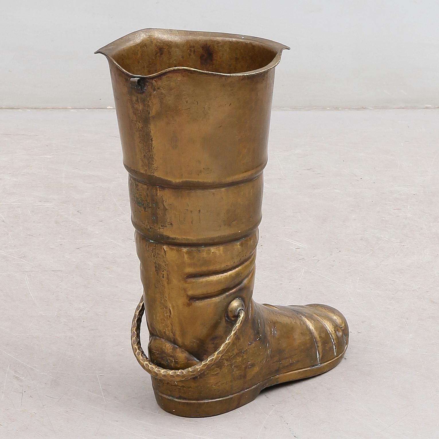 PARAPLYSTÄLL, mässing, 1900-talets första hälft.