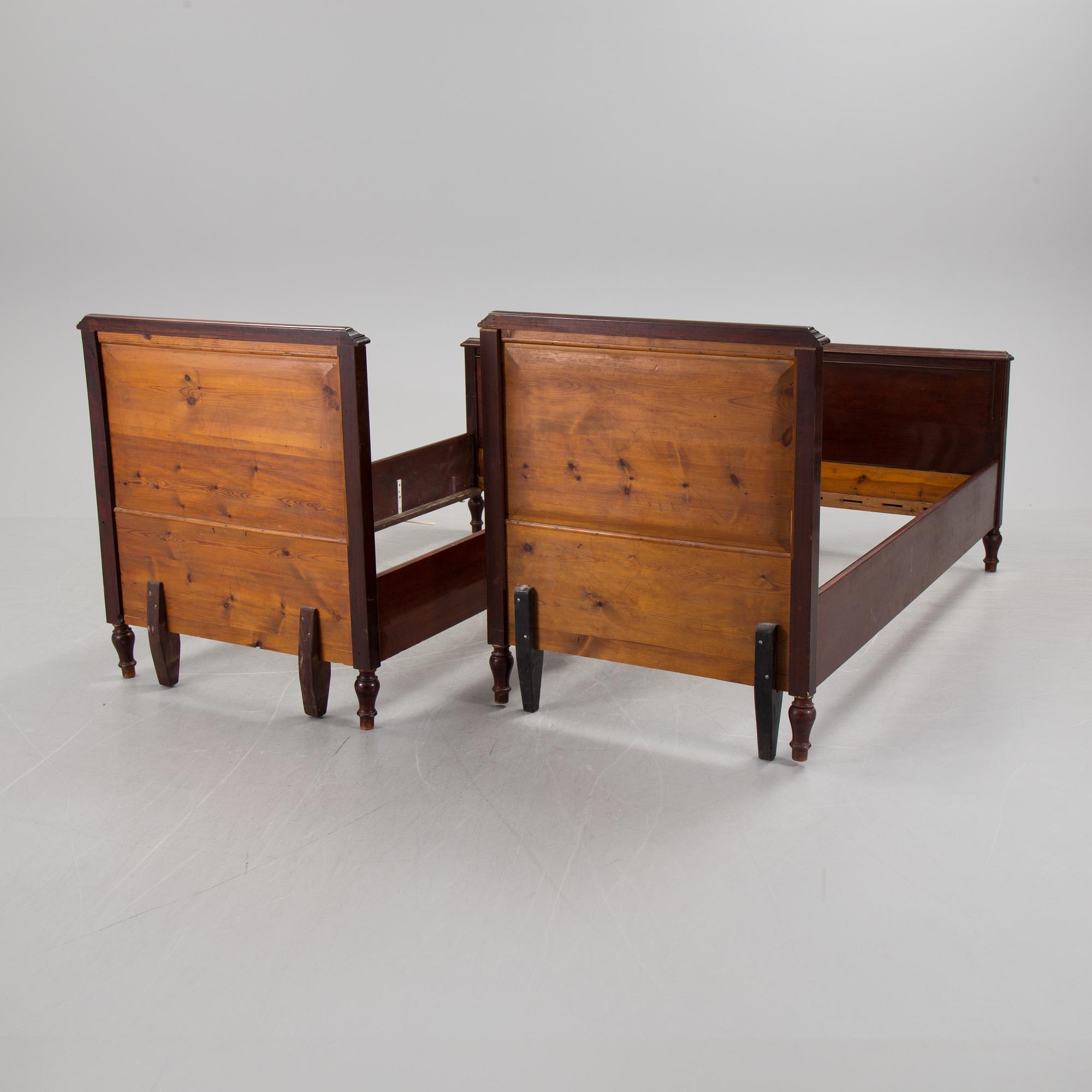 A pair of  mahognay veneered headboards from around year 1900.