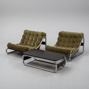 A pair of 'Impala' lounge chairs with table by Gillis Lundgren for IKEA, released 1972.