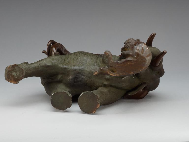 A large Japanese bronze sculpture of an elephant attacked by tigers, with seal mark, Meiji, circa 1900.