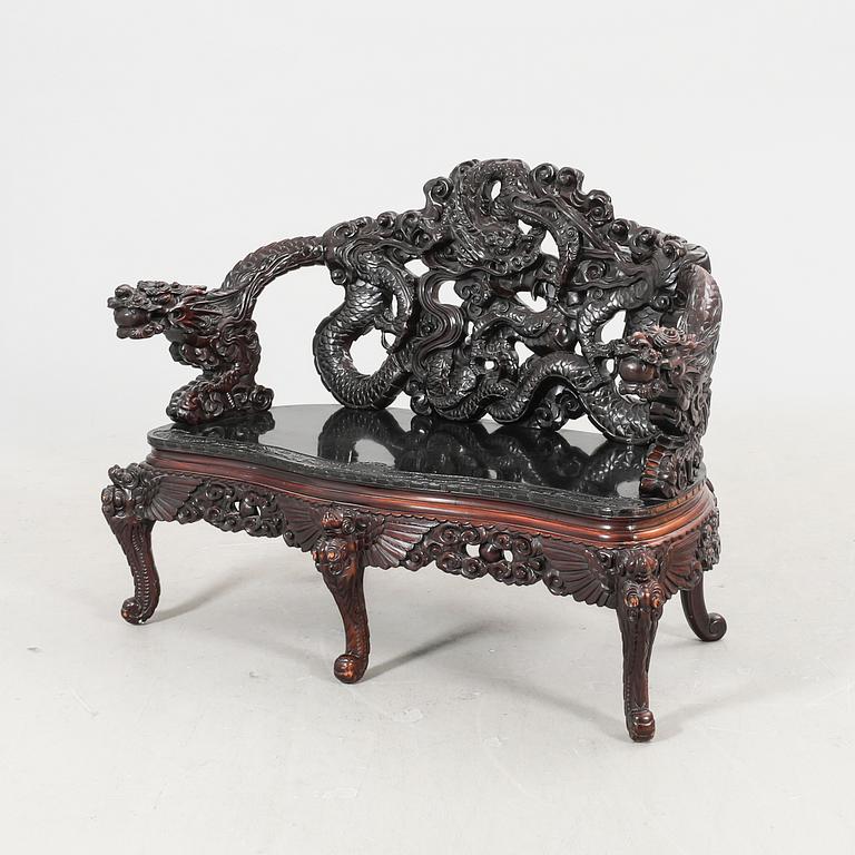 A Chinese wooden sofa 20th century.