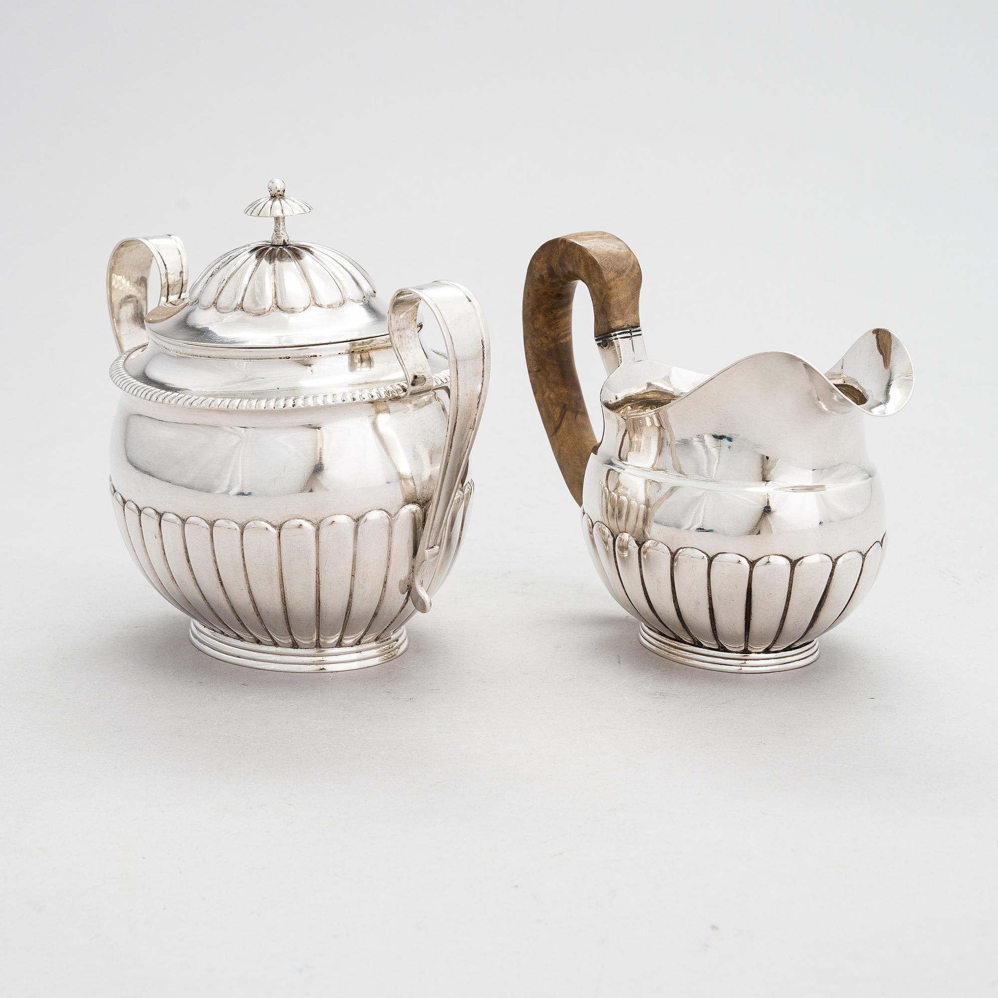 A cream jug and a sugar bowl, maker's mark of Petter Turulin, Sortavala 1824 and 1827.