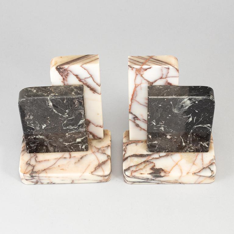 A pair of art déco marble book ends, 1930s.