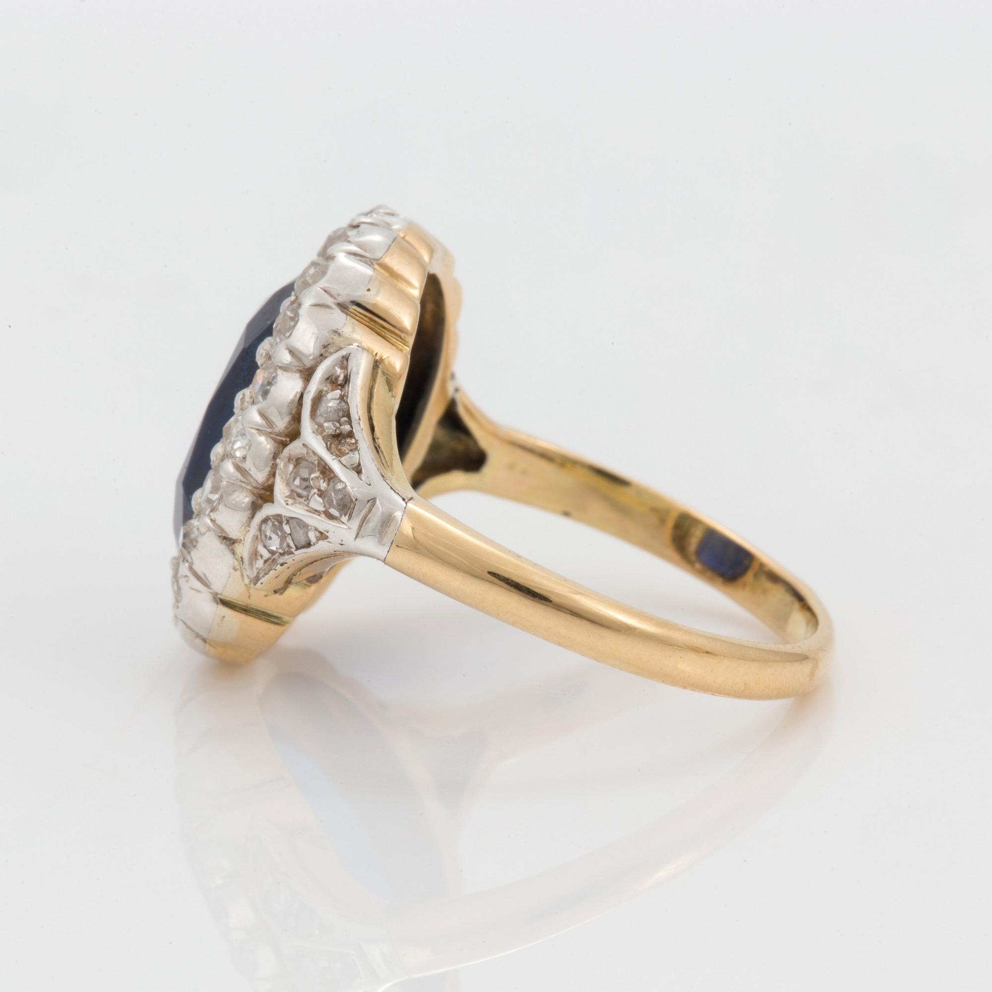 A 7.60 ct unheated sapphire and diamond cluster ring. Certoificate from SSEF.