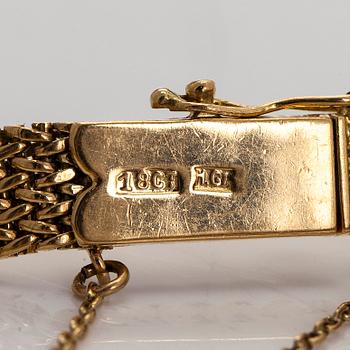 An 18K gold bracelet, Grün Huge & Co.