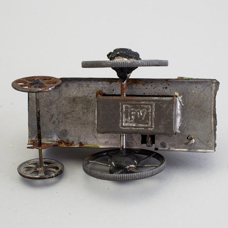 A tinplate train set by E.F. Lefevre, France, ca 1877-1885.