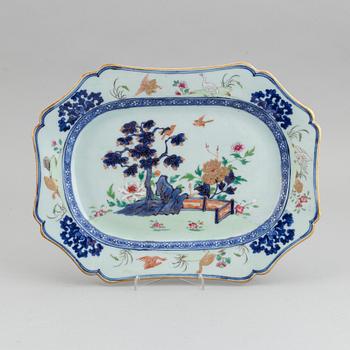 A blue and white, heightened with enamel and gilding porcelain serving dish. Qing dynasty, Qianlong (1736-1795).