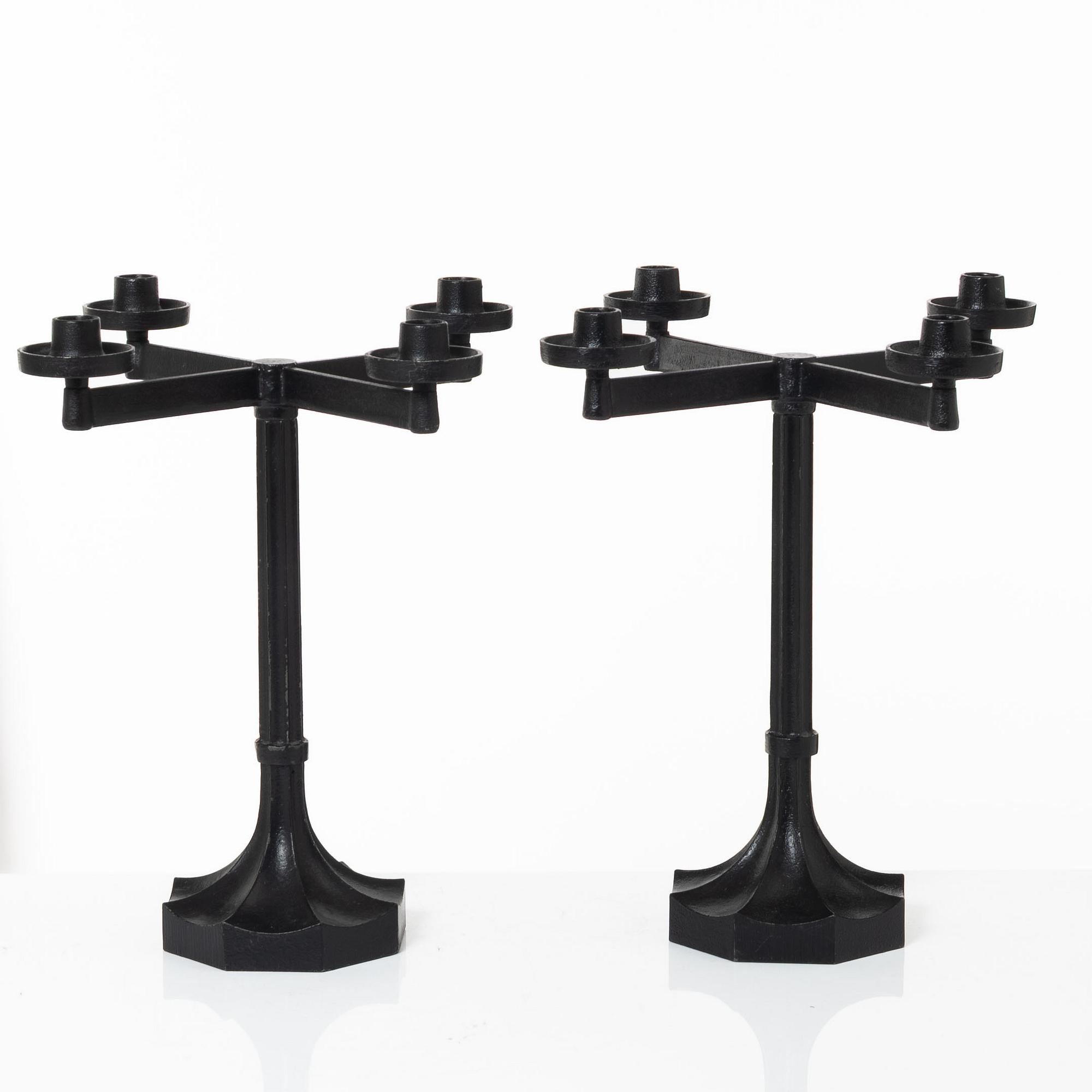 Sigurd Persson, a pair ofa cast iron candelabras, Kockums 1965.