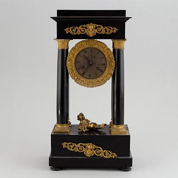 A late Empire´table clock.