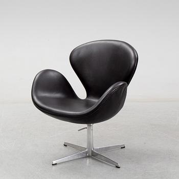 Arne Jacobsen, a black leather 'Swan' chair, Fritz Hansen, Denmark, 1967.