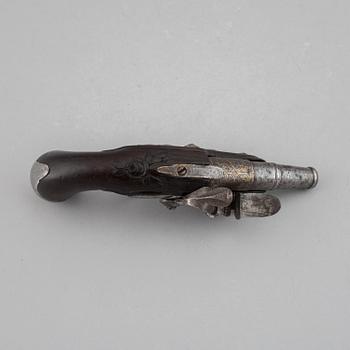 A 18th Century flintlock pistol.