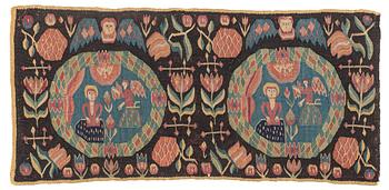 308. A carrige cushion, 'Bebådelsen (The Annunciation)', tapestry weave, 98 x 45 cm, southwestern Skåne 1801, signed MID.