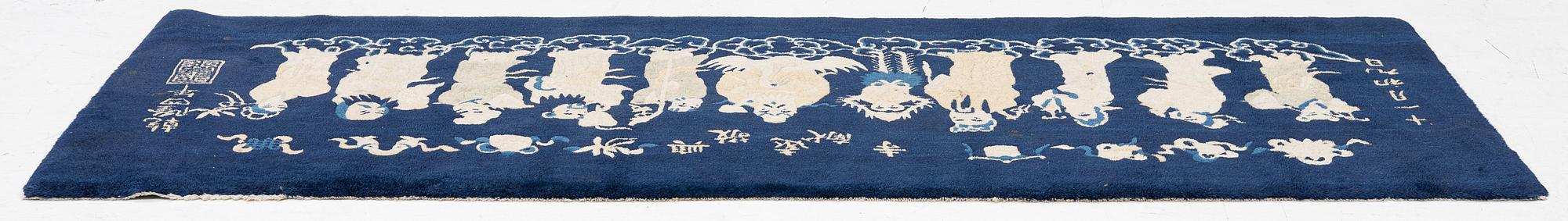 A Chinese 'immortals' carpet, Baotou, Measure: approx. 75 x 185 cm.