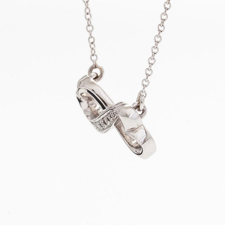 Tiffany & Co, Paloma Picasso, "Double Loving Heart" kaulakoru, 18K valkokultaa ja briljanttihiottuja timantteja.